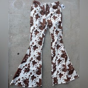 Cow print bell bottom jeans